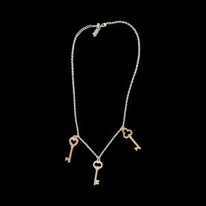 Elegant Silver and Gold Key Pendant Necklace